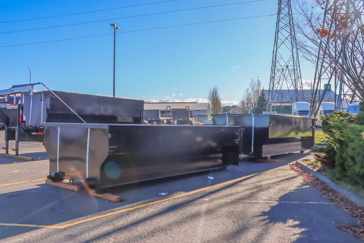 Roll-off dumpster ready for waste disposal at job site for Construction Dumpster Rental in Greenville